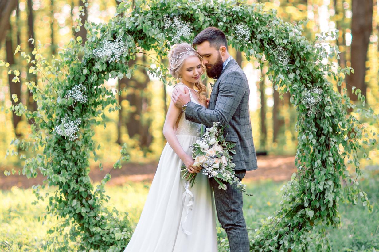 Wedding Arch framing a Bride and Groom