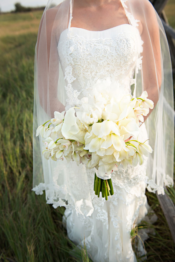 Gorgeous lace cathedral veil and white orchid bouquet