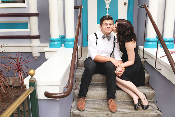 Cute couple in their Disneyland Engagement photos by Scot Woodman Photography