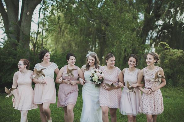 vintage bride and bridal party in pink bridesmaid dresses