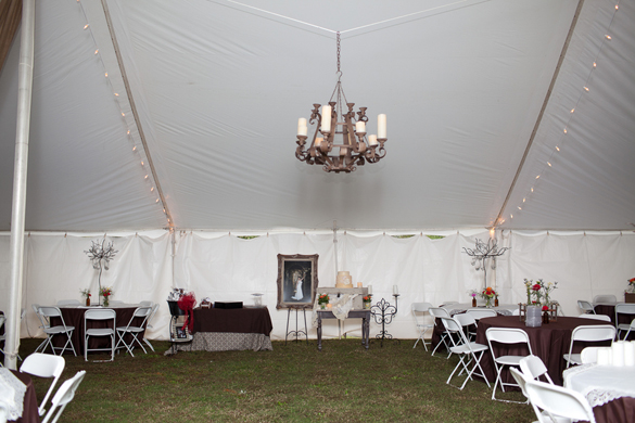 southern wedding reception tent with vintage decor 