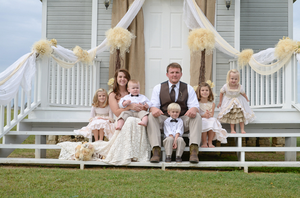 Bride and Groom with kids in their southern DIY wedding