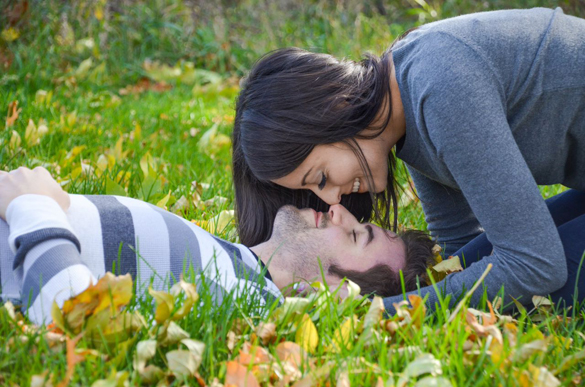 engagement photo couple in grass 