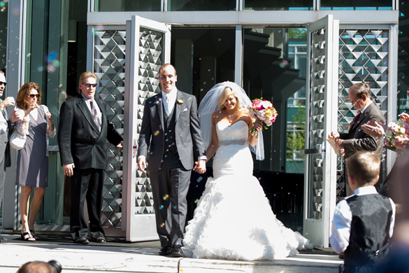 Bride and Groom leaving ceremony at Wayne State University
