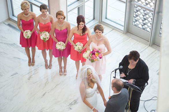 Vibrant bridesmaid dresses in modern wedding ceremony