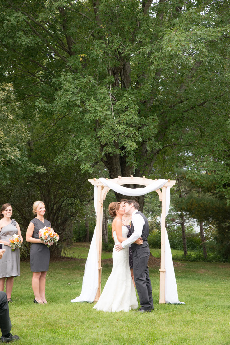 Wedding-Kiss in Backyard Wedding Ceremony