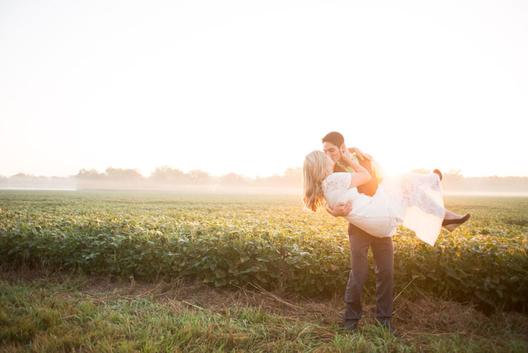 Sunset engagement photos in a Kansas sunflower field