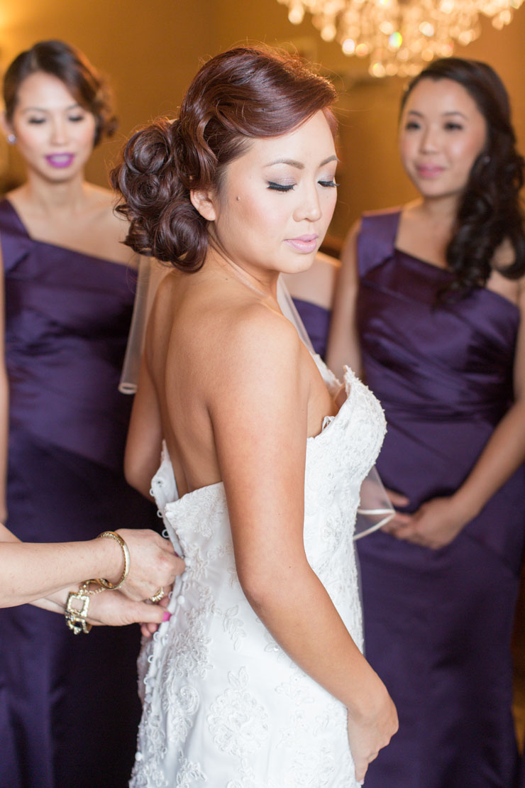Getting ready! Bridesmaids in long purple dresses
