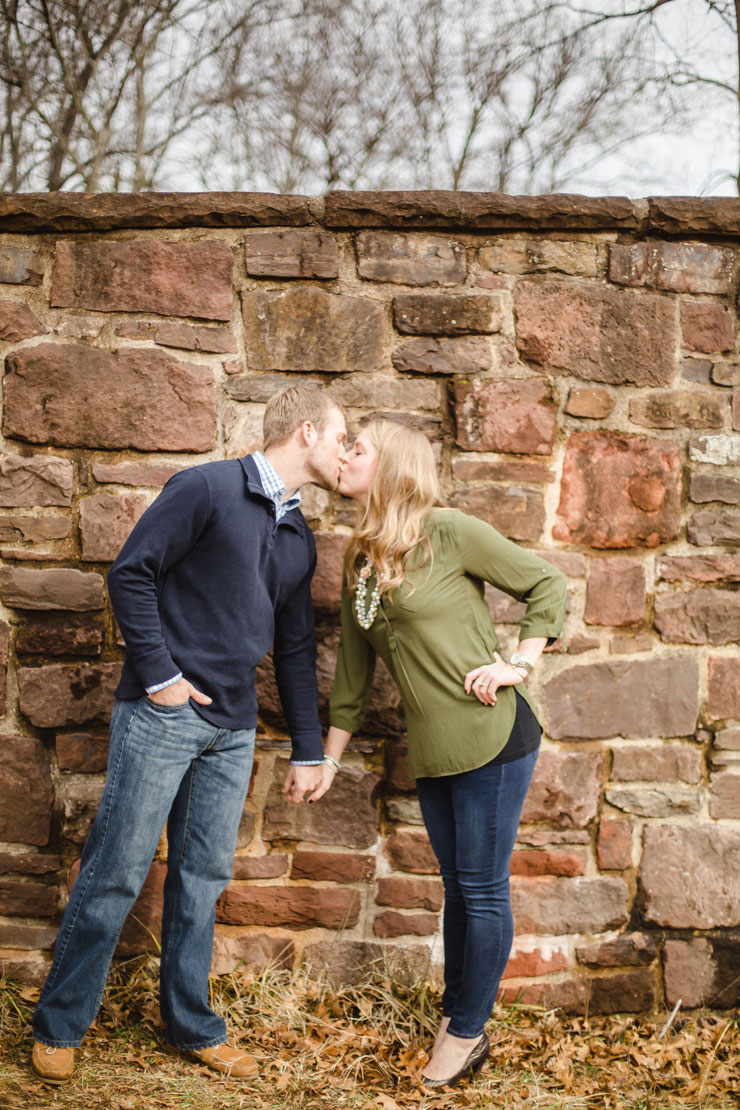 Manassas Battlefield National Park engagement session of couple by a stone wall (photos by Hay Alexandra Photography).