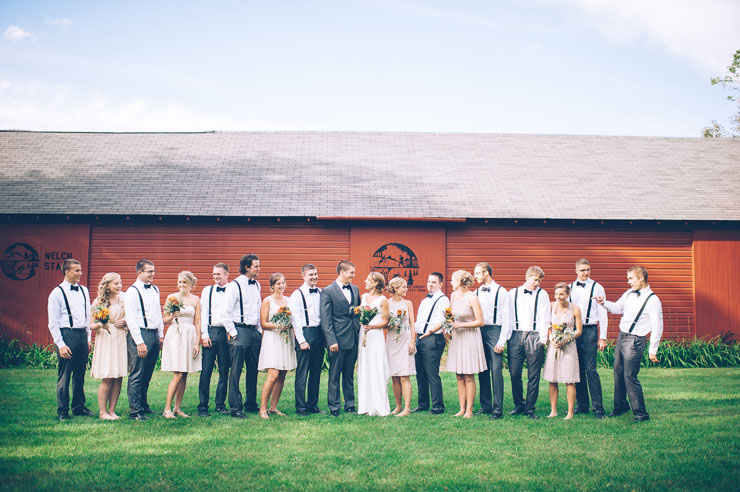 Mix and match bridesmaid dresses and groomsmen in bow ties