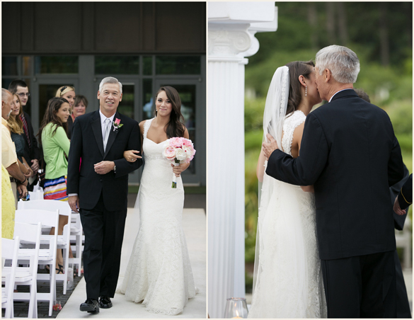 Father daughter going down the aisle at outdoor wedding