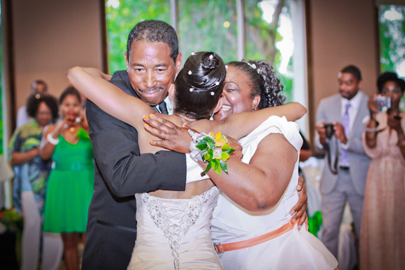 Father-daughter dance with mom-photo by Adan Photo