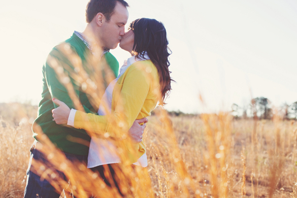 rustic NC engagement photos in a field