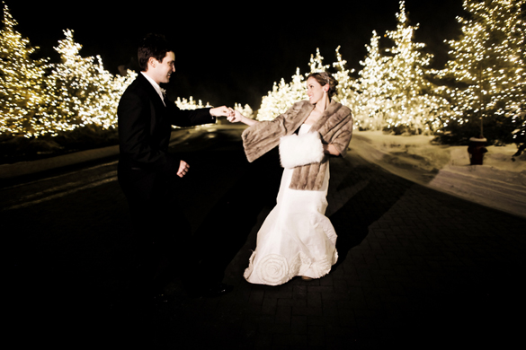 Bride and Groom dancing outside at their winter destination wedding in Park City, Utah