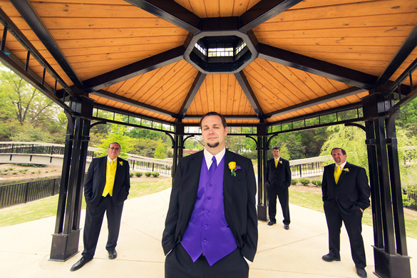 groomsmen dressed in purple and yellow