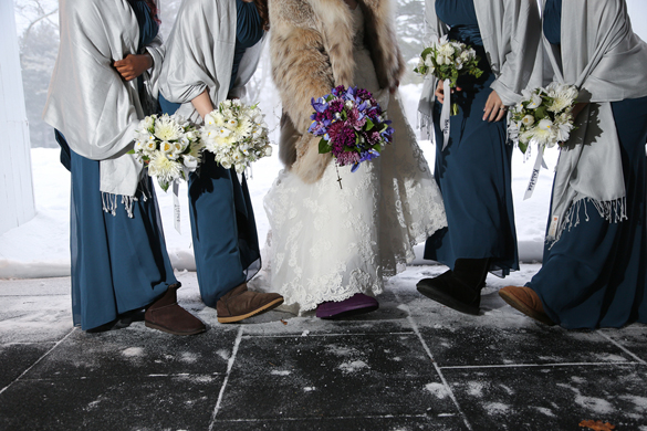bridal party wearing ugg boots in winter wedding