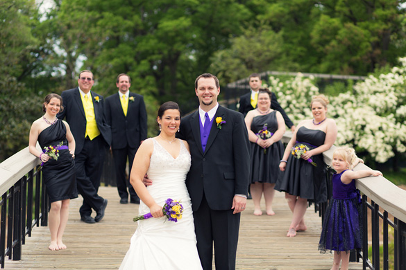 wedding party dressed in purple, black and yellow
