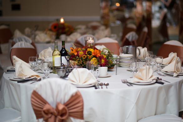 Northern IL's Pescatore Palace: wedding reception tables with floral centerpieces