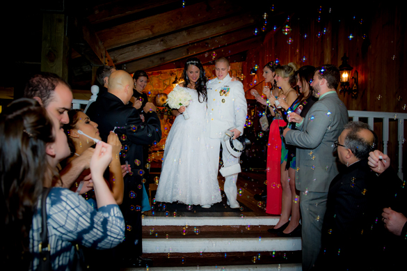Blowing bubbles wedding send-off