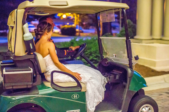 bride and groom getaway golf cart
