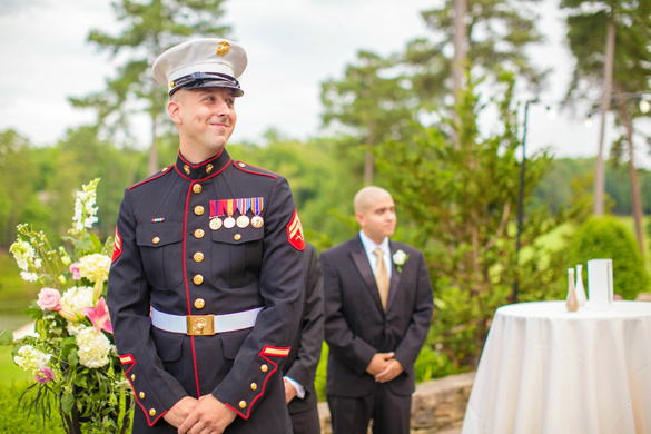 Marine groom waiting for bride to walk down the aisle