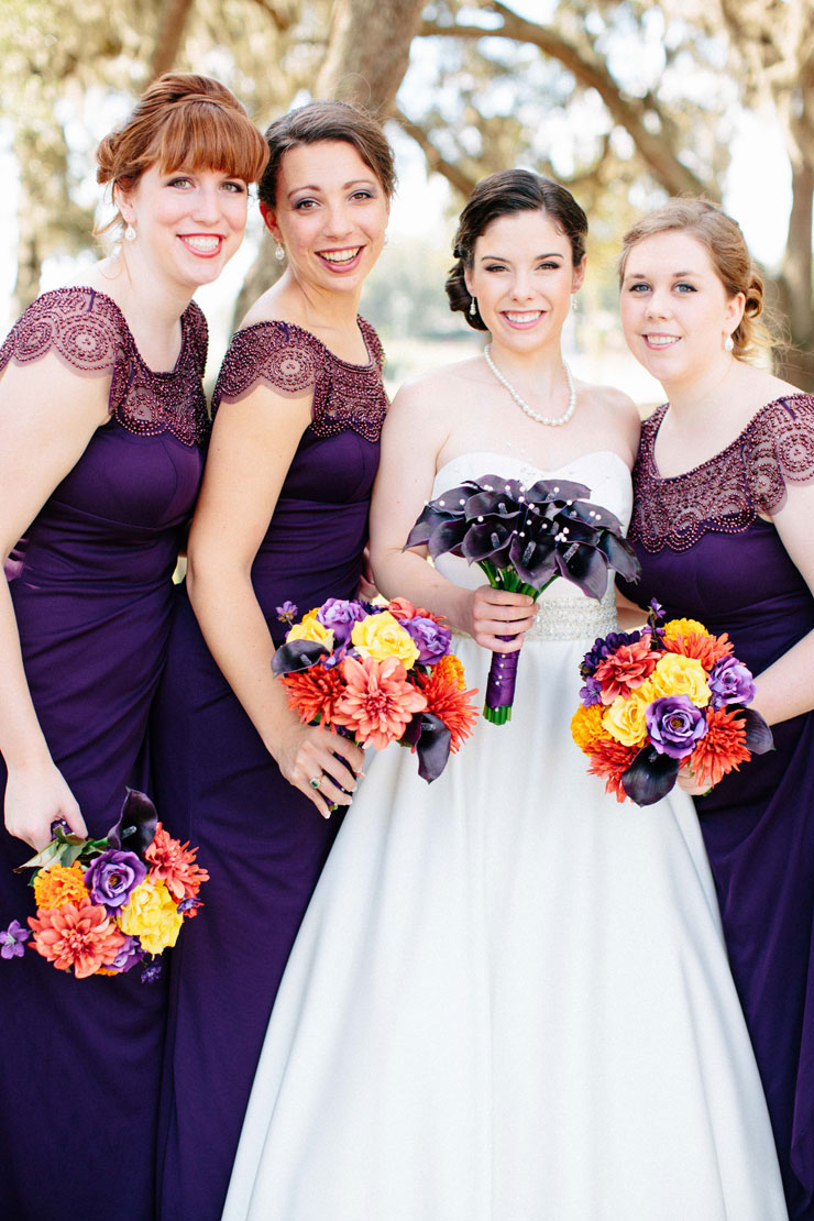 Gorgeous fall wedding with bridesmaids in long purple dresses