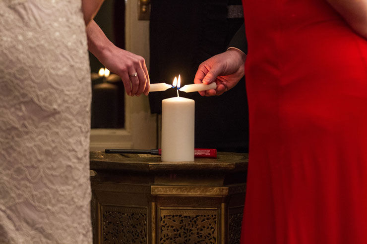 Unity candle in winter wedding