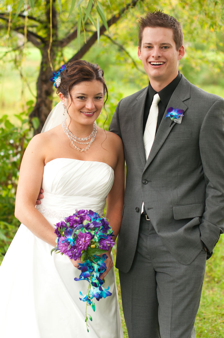 Elegant outdoor teal and purple wedding 