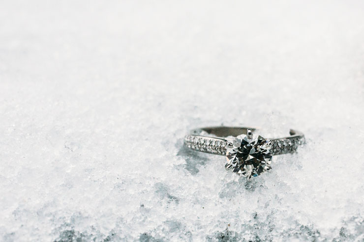Engagement ring photo in the snow--photo by Janelle Rodriguez Photography 